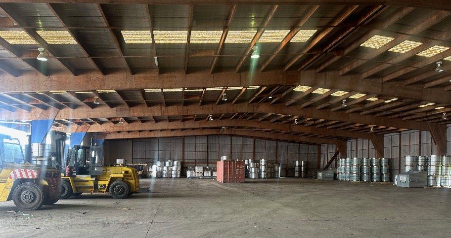 Drums and steel stored in the BCQ warehouse